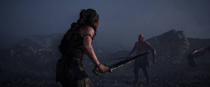 Senua holds a sword and faces off against an enemy in the midde distance in Senua’s Saga: Hellblade 2.
