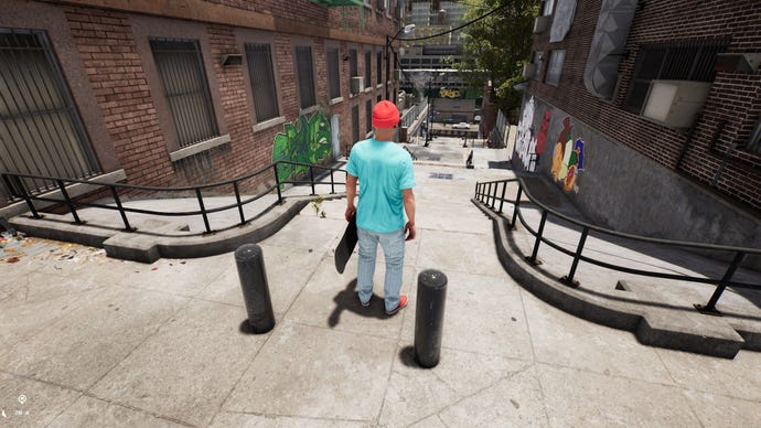 A skater looks down a slope in an urban landscape in Session