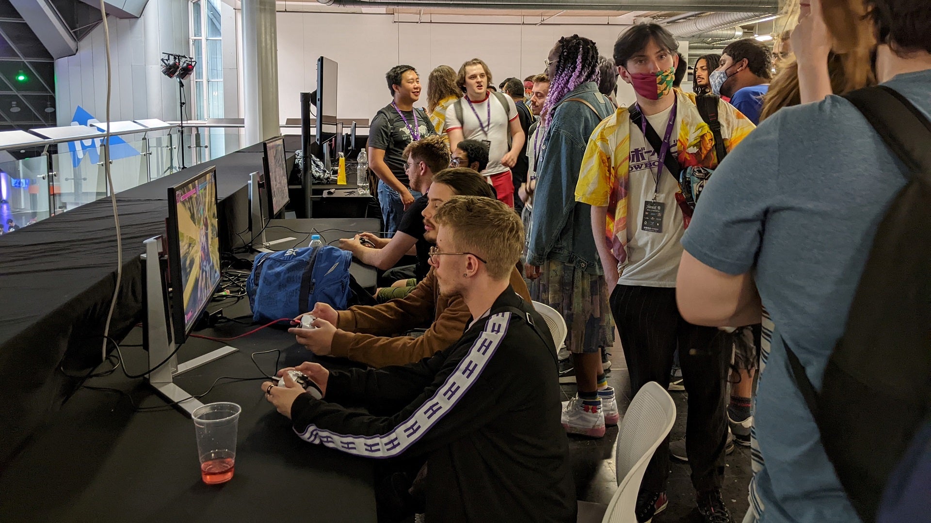 Crowd of people playing the Street Fighter 6 demo at VsFighting