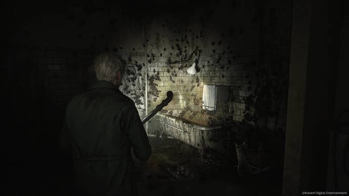 James Sunderland approaches a bathtub covered in insects in the Silent Hill 2 remake