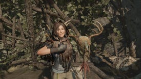 Lara Croft gives the camera a thumbs up next to a creepy dead antler totem in Shadow Of The Tomb Raider