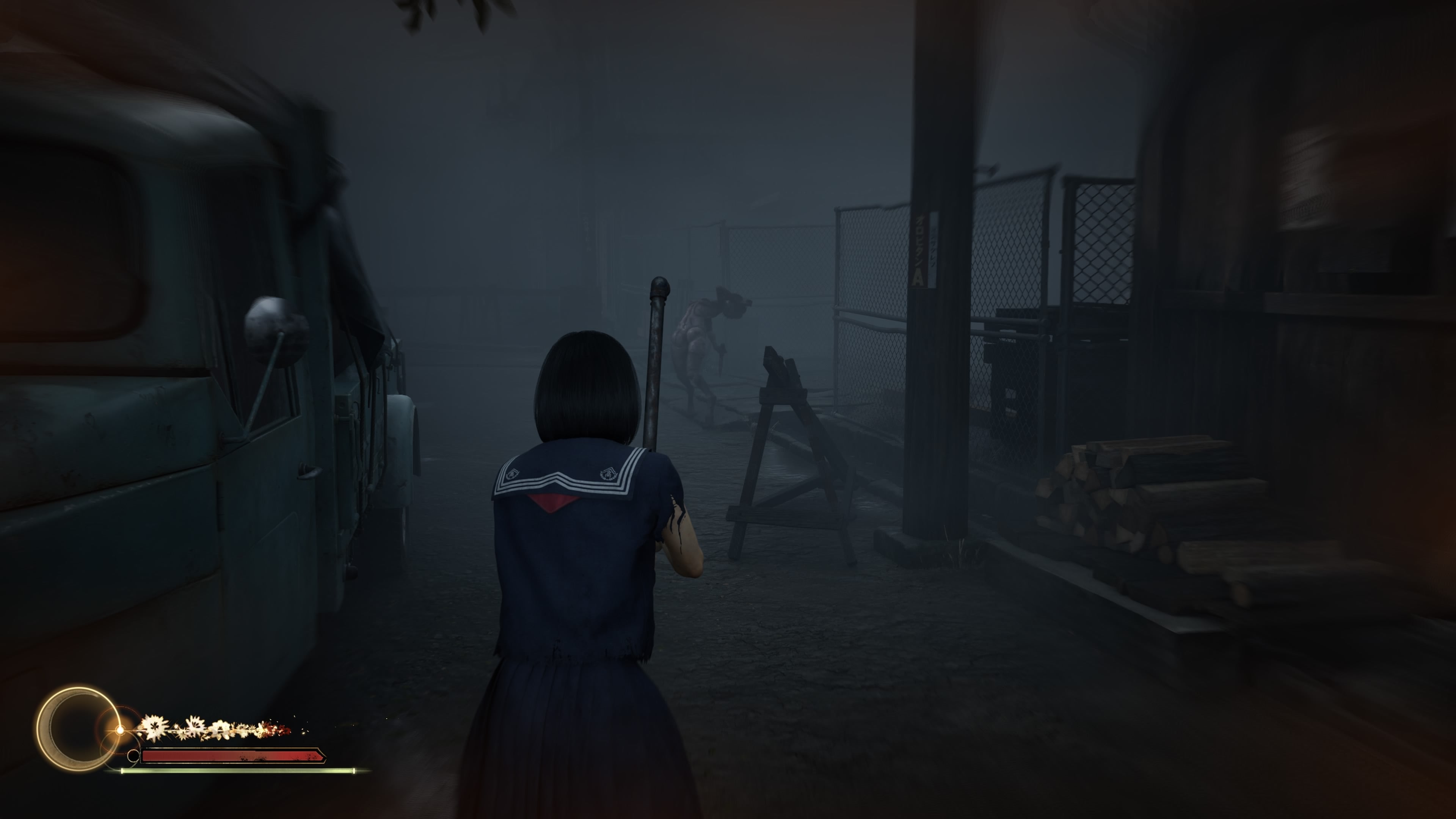 Hinako holds up a pipe as a twisted form, with an arched back holding a knife, seems to move towards her.