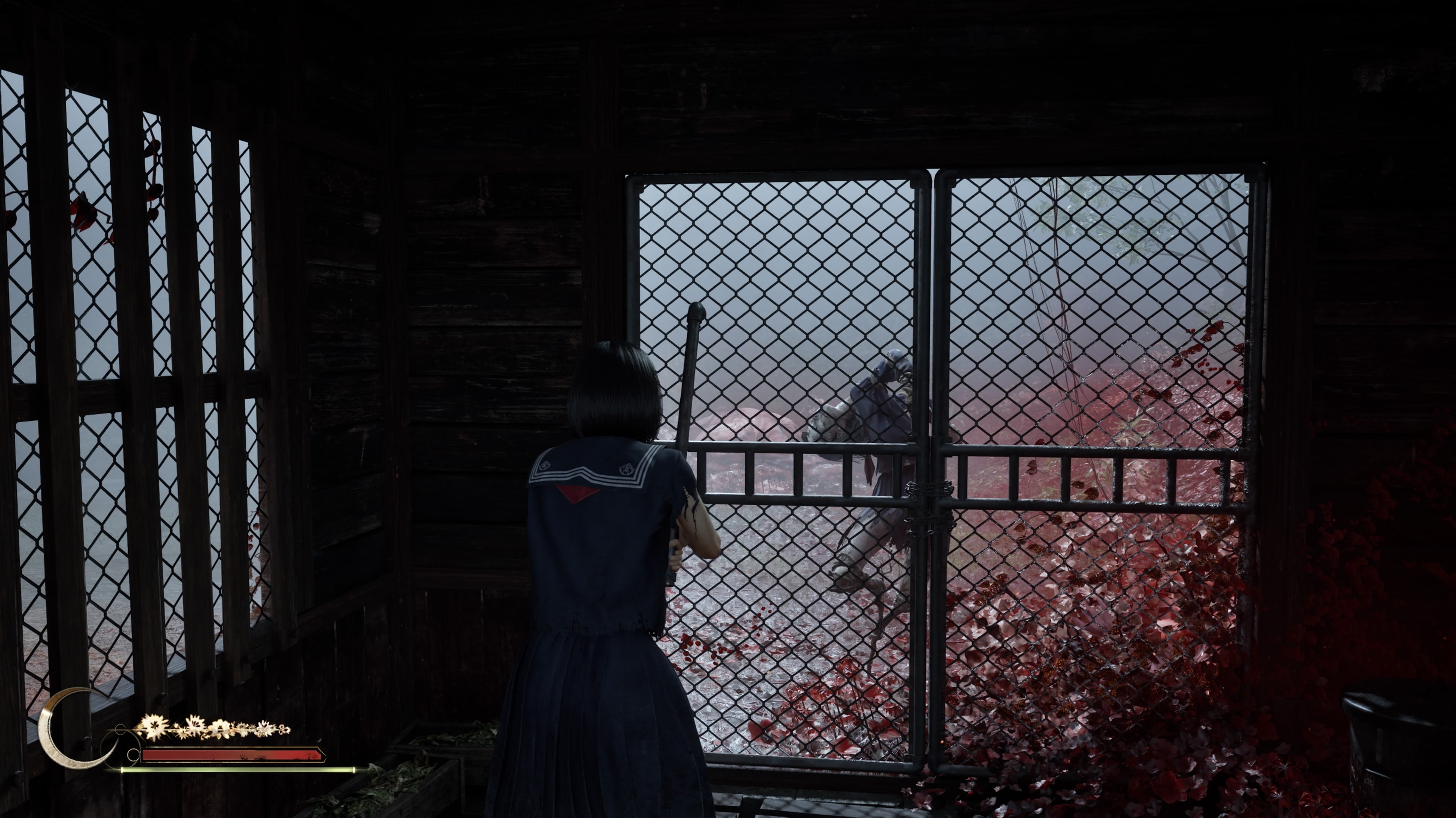 Hinako hides in a dark shed. The only light comes through the steel fence across the door. Outside, in a sea of crimson flowers, a distorted figure stands still, arms and legs bent at impossible angles. Its lower limbs are blades.