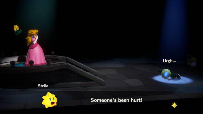 Two: Princess Peach: Showtime! screenshot shows a stage spotlight highlighting a fallen Theet while Princess Peach looks on and gasps.