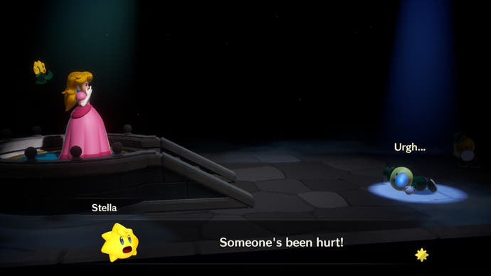 Two: Princess Peach: Showtime! screenshot shows a stage spotlight highlighting a fallen Theet while Princess Peach looks on and gasps.