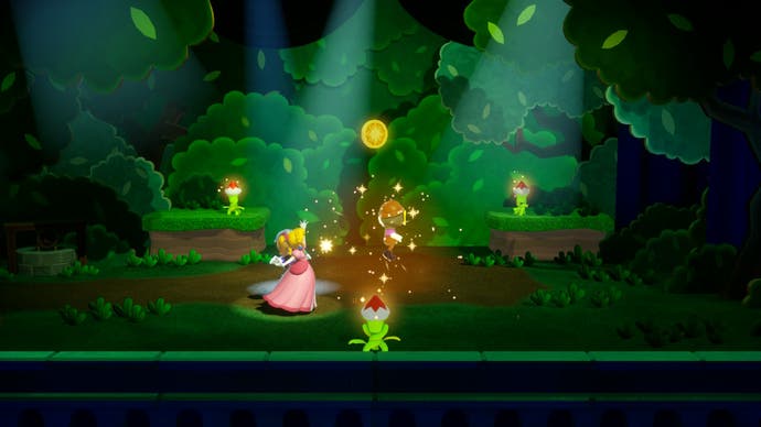 Four: Princess Peach: Showtime! screenshot shows Peach using gold sparkles to release a gold coin from behind a flower prop.