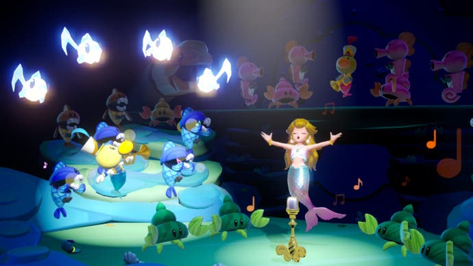 Six: Princess Peach: Showtime! screenshot shows Peach dressed as a mermaid surrounded by fish and orange music notes.