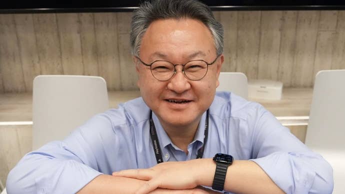 Picture of Shuhei Yoshida smiling with arms folded