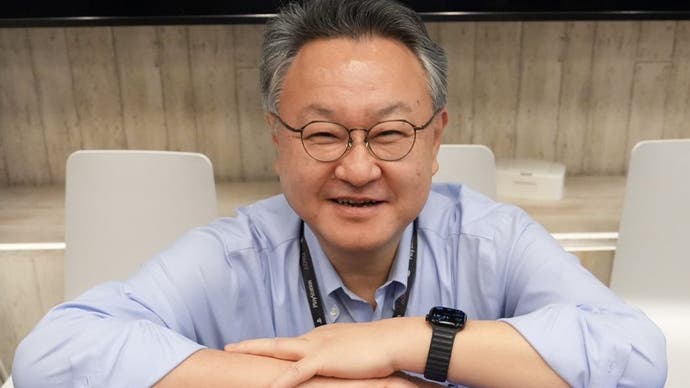 Picture of Shuhei Yoshida smiling with arms folded