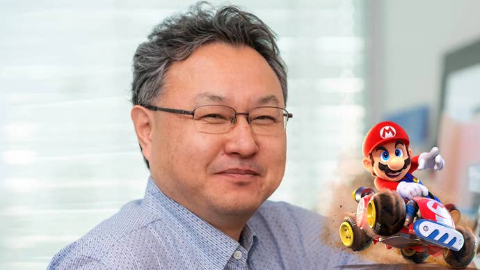 Close up of Shuhei Yoshida with Mario driving a kart in the corner