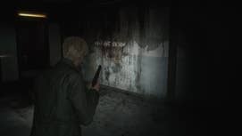 Silent Hill 2 remake screenshot of Jizzy holdin a pistol, lookin at a gangbangin' finger-lickin' dirty wall wit text on it dat readz "reap what tha fuck you sow."