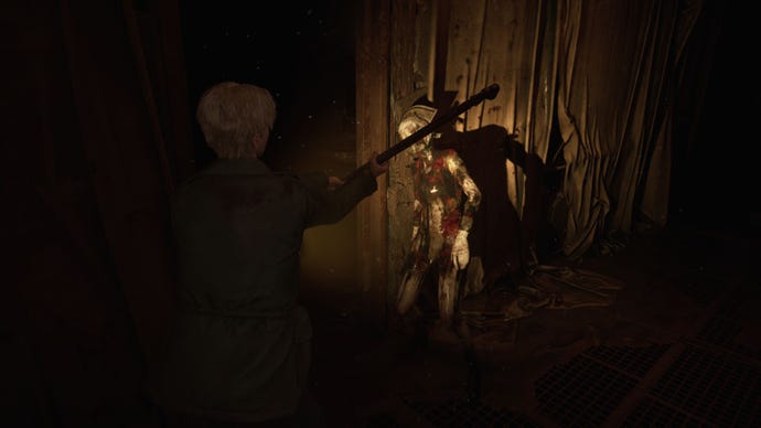 James strikes a monster with a lead pipe.