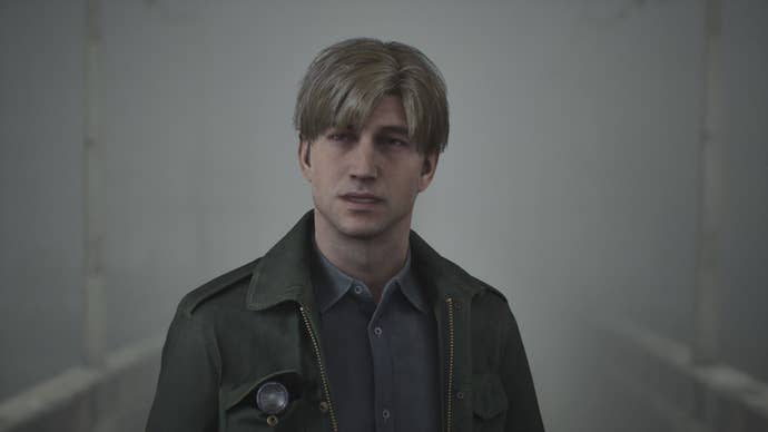 James looks into the camera, surrounded by fog.