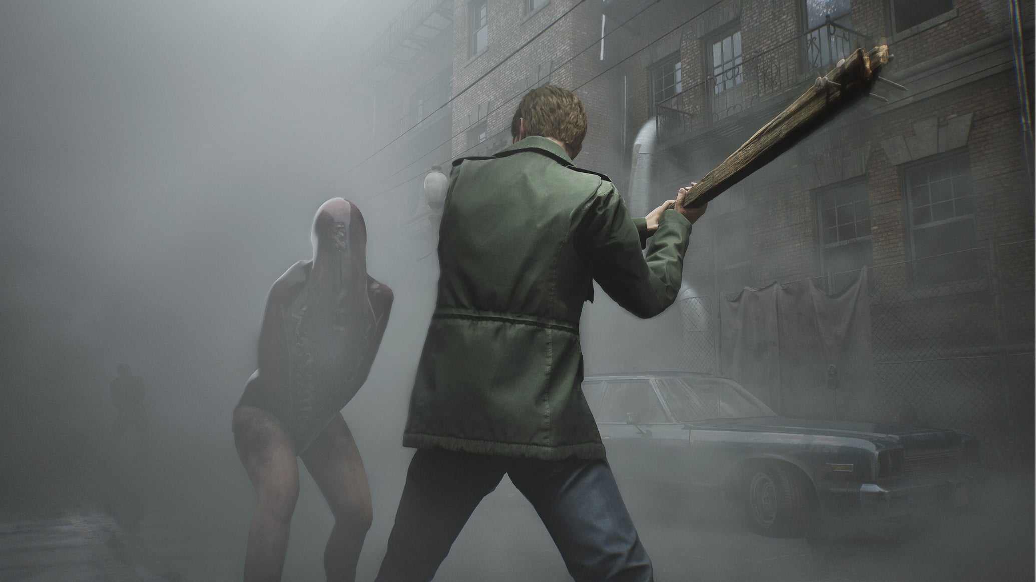 A man prepares to swing a baseball bat at an armless monster in the Silent Hill 2 remake - 1