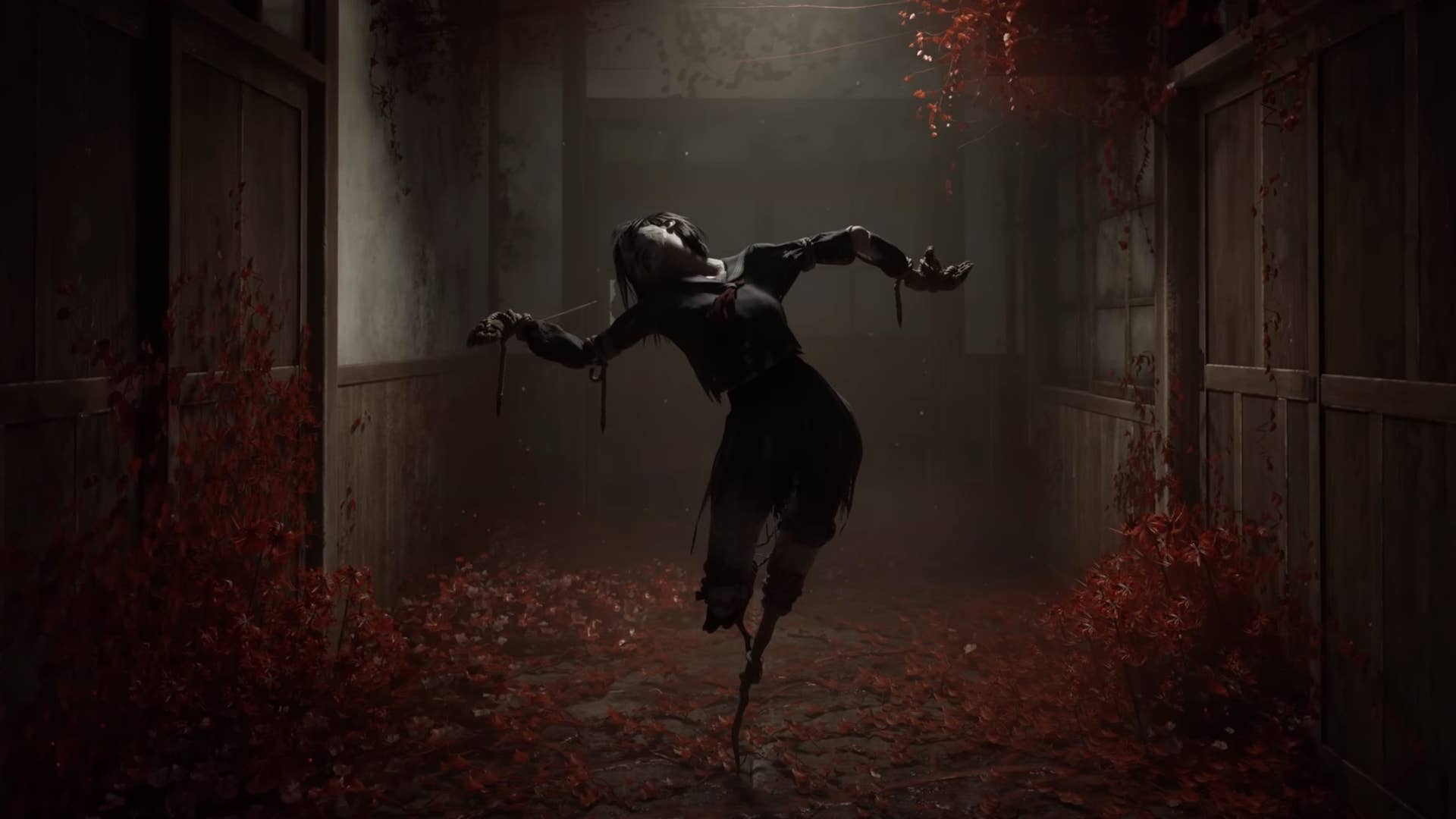 A scene from the Silent Hill f trailer showing a scarecrow-like figure resembling an awkwardly twisted Japanese school girl balanced on spindly limbs. It stands illuminated by a dim light in a hallway covered in blood-red blooms.