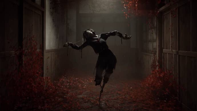 A scene from the Silent Hill f trailer showing a scarecrow-like figure resembling an awkwardly twisted Japanese school girl balanced on spindly limbs. It stands illuminated by a dim light in a hallway covered in blood-red blooms.