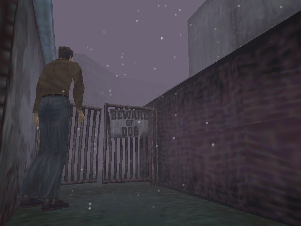 Harry Mason approaches a gate that reads 'Beware of Dog' in Silent Hill - 4