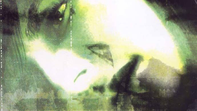 The old PS2-era box art for Silent Hill 2. A posterised, green-hued close-up of a lady’s face who appears to be lying down on the floor.