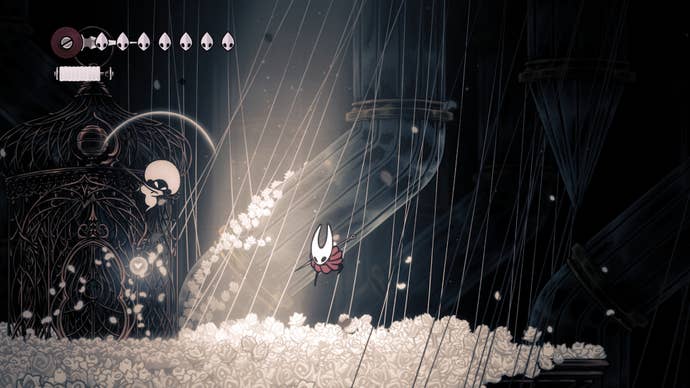 Hollow Knight Silksong official screenshot showing you in a black world with strange fluffly white bubbles