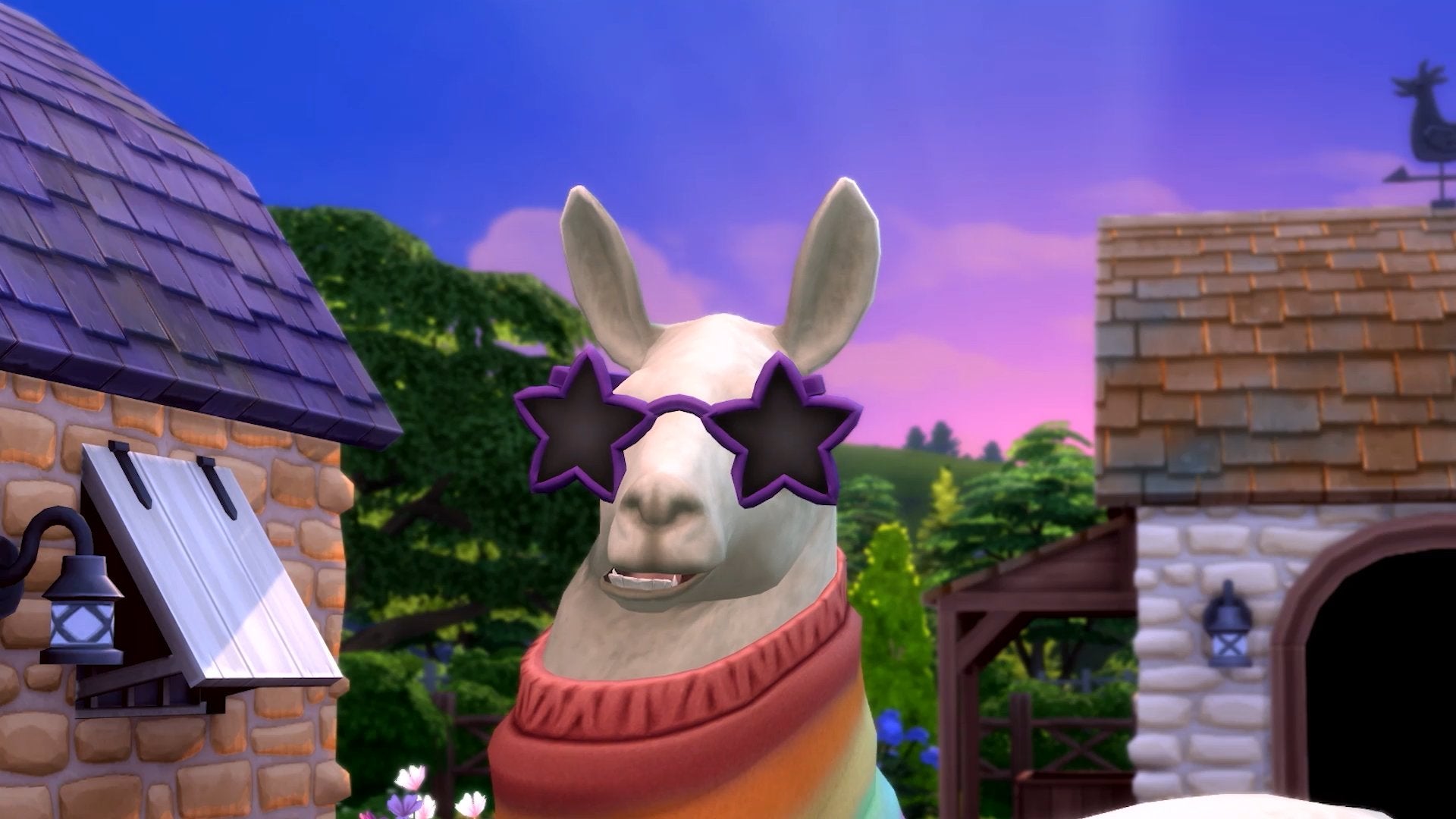 A close-up headshot of a llama wearing star-shaped sunglasses and a rainbow scarf.