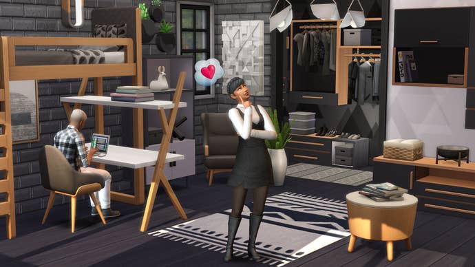 A sim admires her monochrome digs.