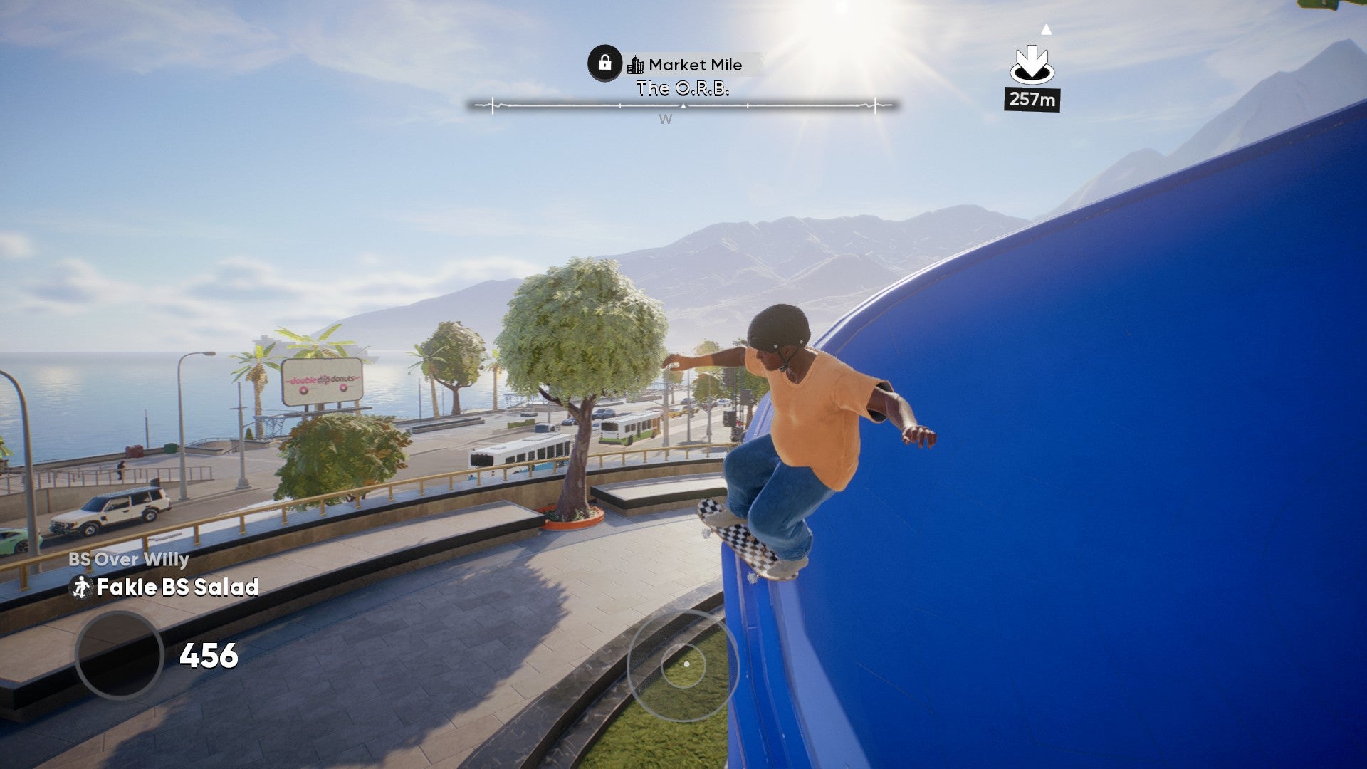 Skate screenshot showing you grinding on a large blue building of some kind