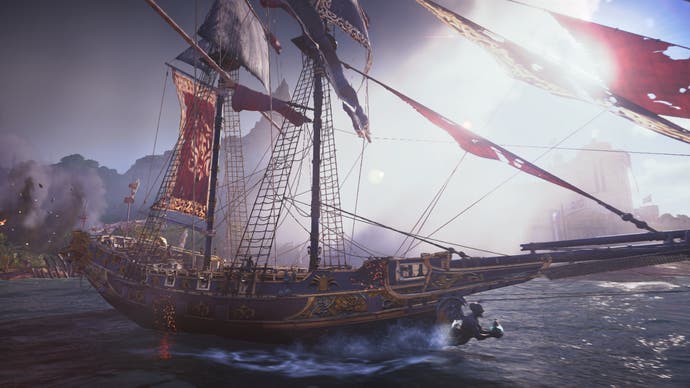Skull and Bones screenshot showing a triumphant-looking ship with red sails from the side