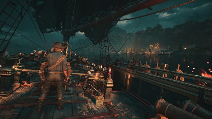 Skull and Bones screenshot showing pirates on the deck of the ship at night