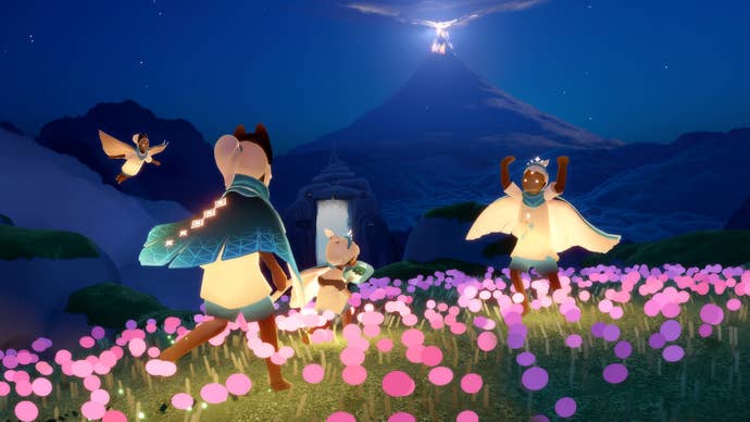 A Sky: Children of Light screenshot showing several players interacting in a field of flowers at night. A tall mountain with a beam of light coming from its peak is visible in the background.