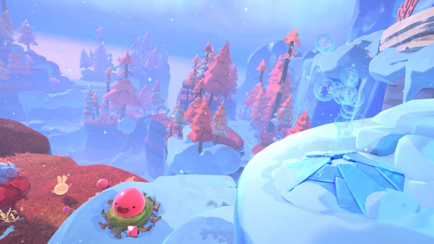 A snowy hillside in Slime Rancher 2.