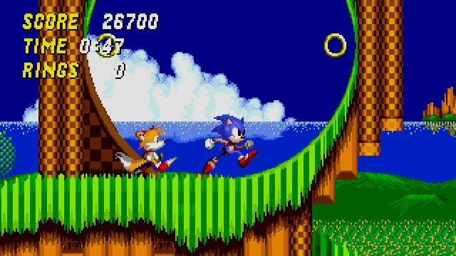 Sonic and Tails prepare to run a loop in a Sonic the Hedgehog 2 screenshot. - 1