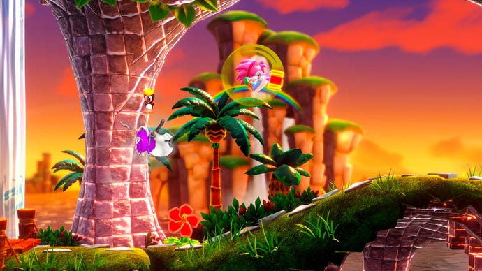 Amy activates a special hammer ability as she jumps off a swirly ramp in Sonic Superstars.