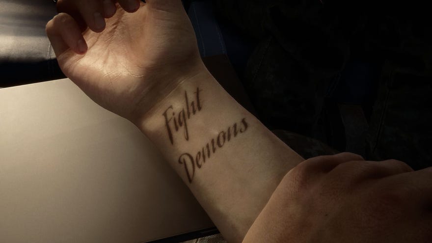 The protagonists terrible tattoo in Sons Of The Forest: script on the inside of his right wrist reading ‘Fight Demons’