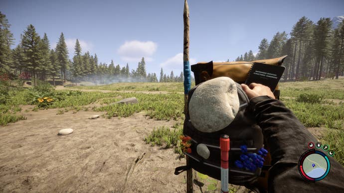 The player holds up their backpack in Sons Of The Forest.