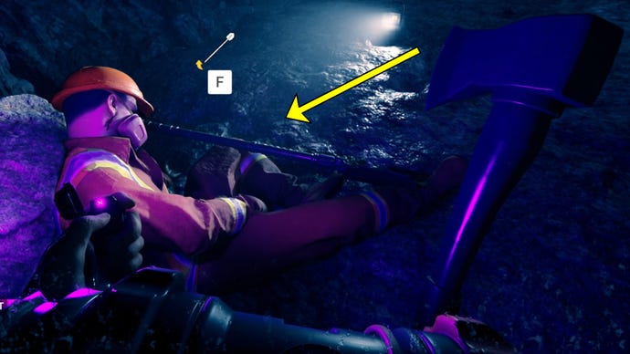 The player in Sons Of The Forest loots the Shovel from a corpse in a cave.