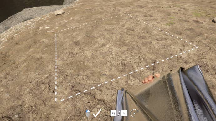 The player in Sons Of The Forest prepares to place down a Tarp on the beach.