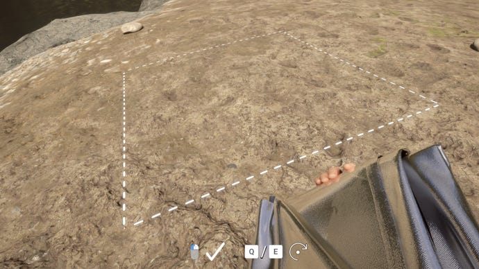 The player in Sons Of The Forest prepares to place down a Tarp on the beach.