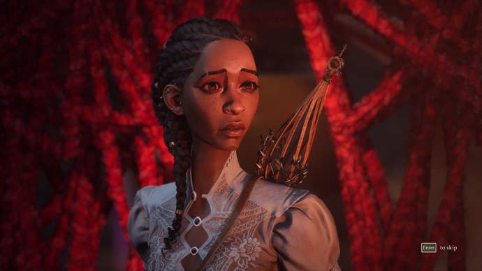 Hazel looks worried as she stands in front of red threads.