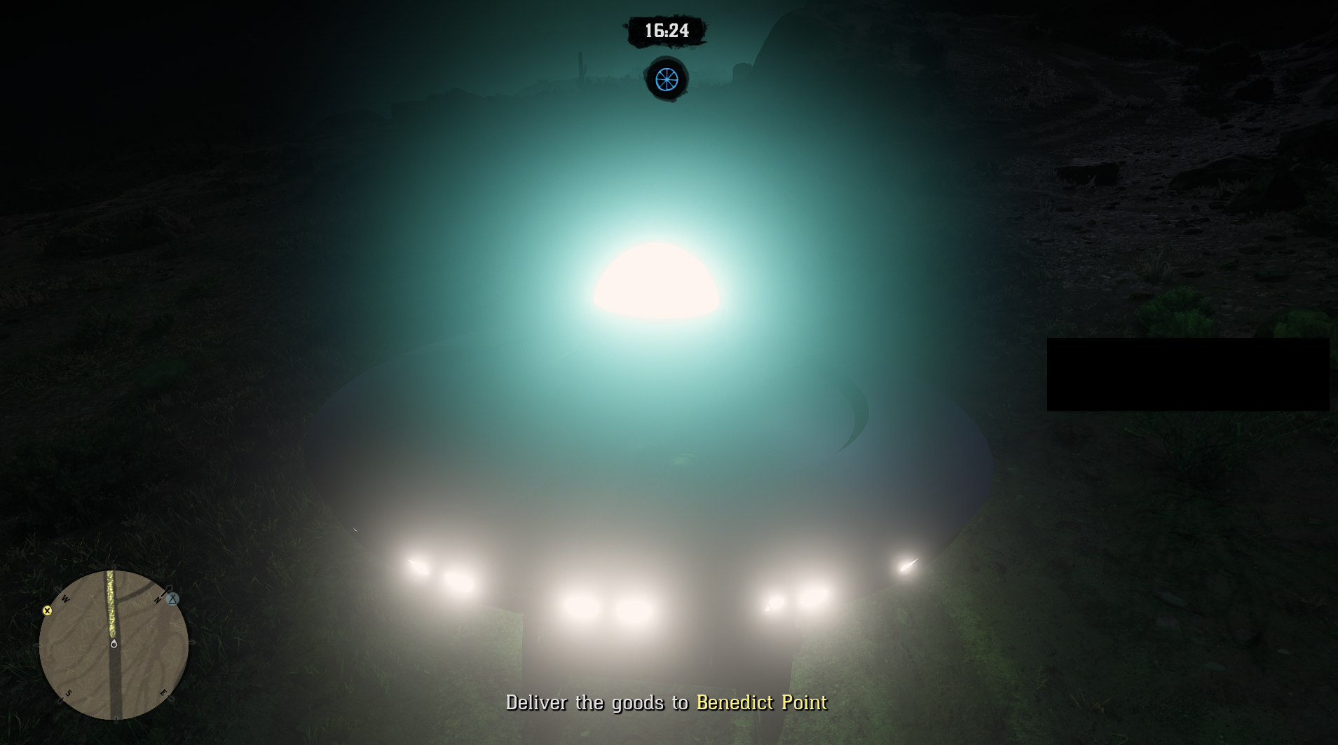 Red Dead Online - at night, a UFO fills up the screen, it&rsquo;s a large turquoise light with several smaller white lights along the base, the rest is hard to see