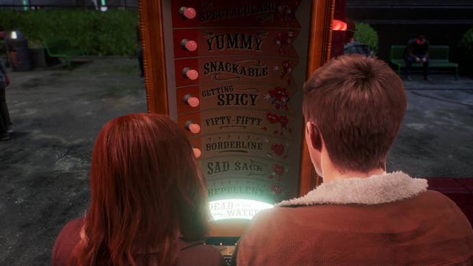 A view over the shoulders of Peter Parker and MJ Watson as they use a love tester machine at the carnival. According to the test, they have the worst possible compatability.