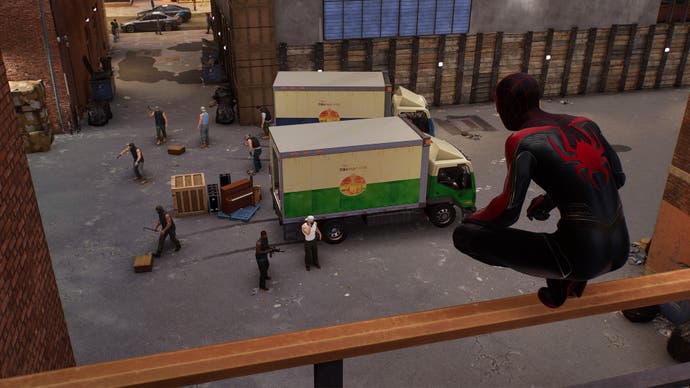 spider-man 2 miles looking at two museum heist criminal trucks