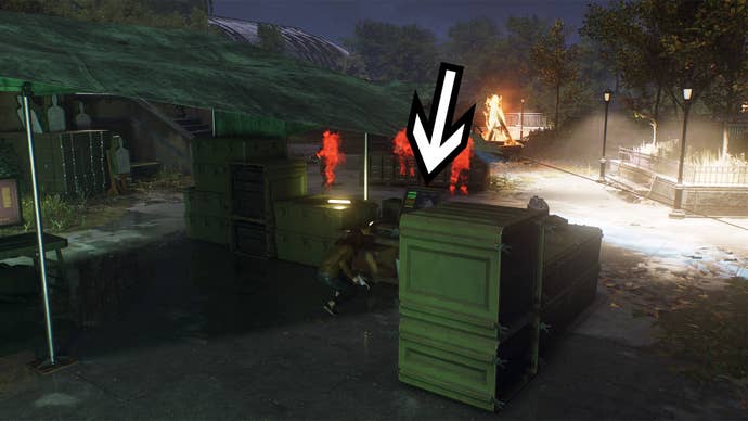 spider-man 2 mj is crouching behind cover in a shelter with a big arrow pointing to the drone computer terminal