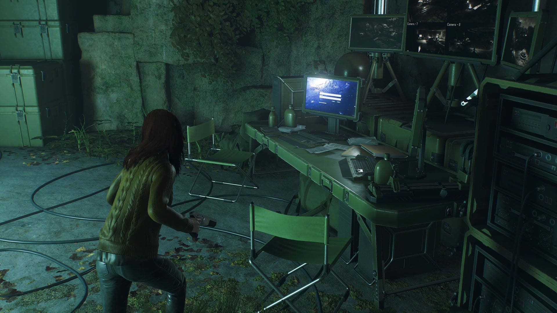 spider-man 2 mj facing computer terminal in a cave