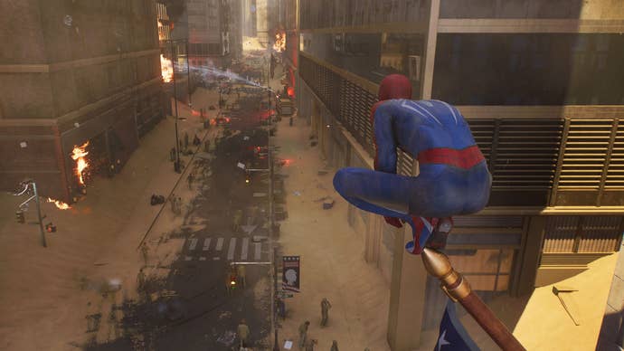spider-man 2 peter crouching on flagpole looking at a sandy street