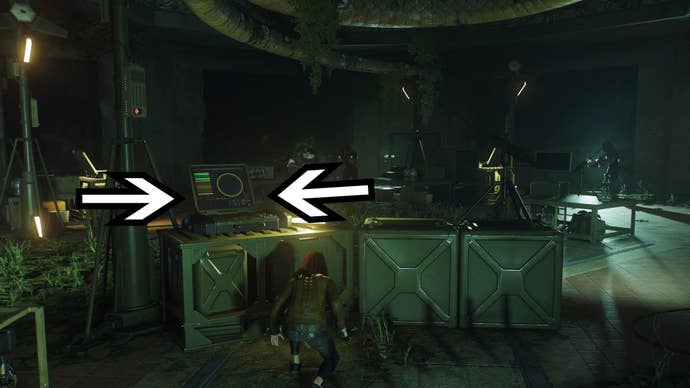 spider-man 2 mj is behind cover in the reptile house with two arrows pointing to the computer terminal to her left.