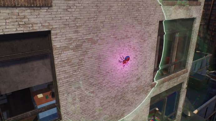 spider-man 2 spider-bot on wall of building