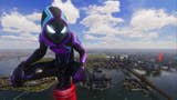 spider-man 2 spider-man 2099 miles morales crouching on top of avengers tower beacon