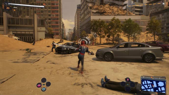 Spider-Man's Spider-sense warns him of an incoming attack while fighting enemies on a sand-swamped street in New York City.