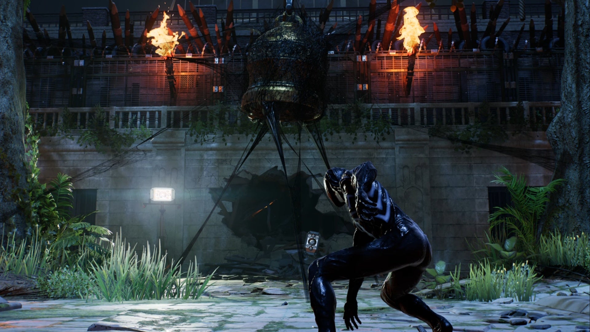 spider-man 2 symbiote peter facing webbed up courtyard bell in kraven&rsquo;s lair