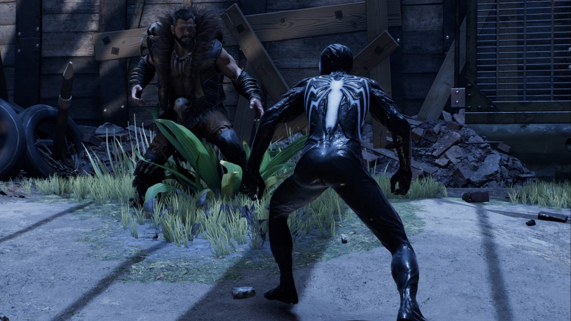 spider-man 2 symbiote peter in defensive stance facing kraven